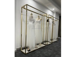 Стійка для весільних та вечірніх суконь 1200х400х2200мм. золота з полицею Стійка для весільних та вечірніх суконь 1200х400х2200мм. золота з полицею